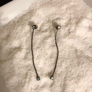 Single strand simple gem dangling earrings.